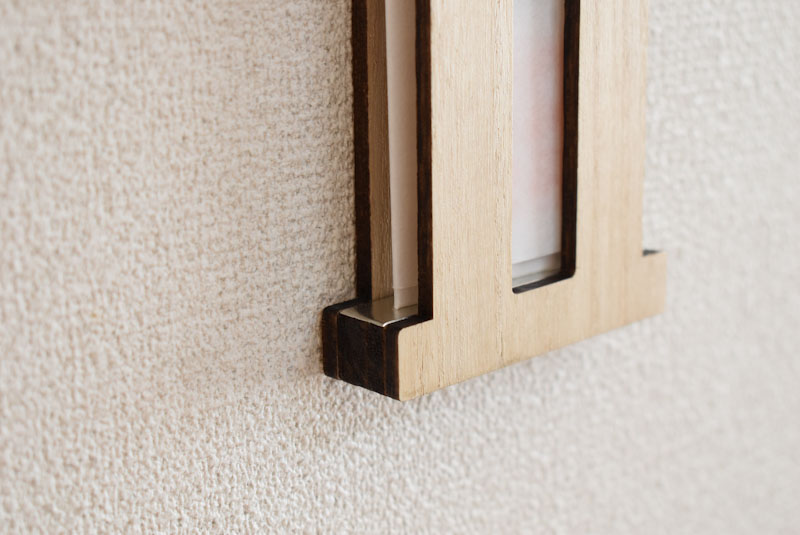 鳥居の神棚の画像4（スズの板）